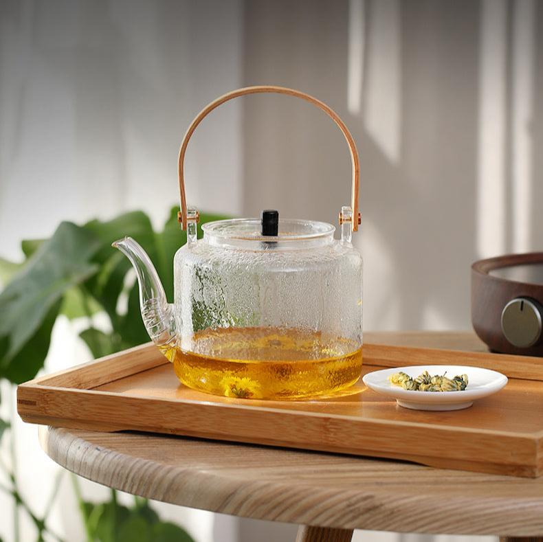 This is a glass teapot. This is a glass kettle