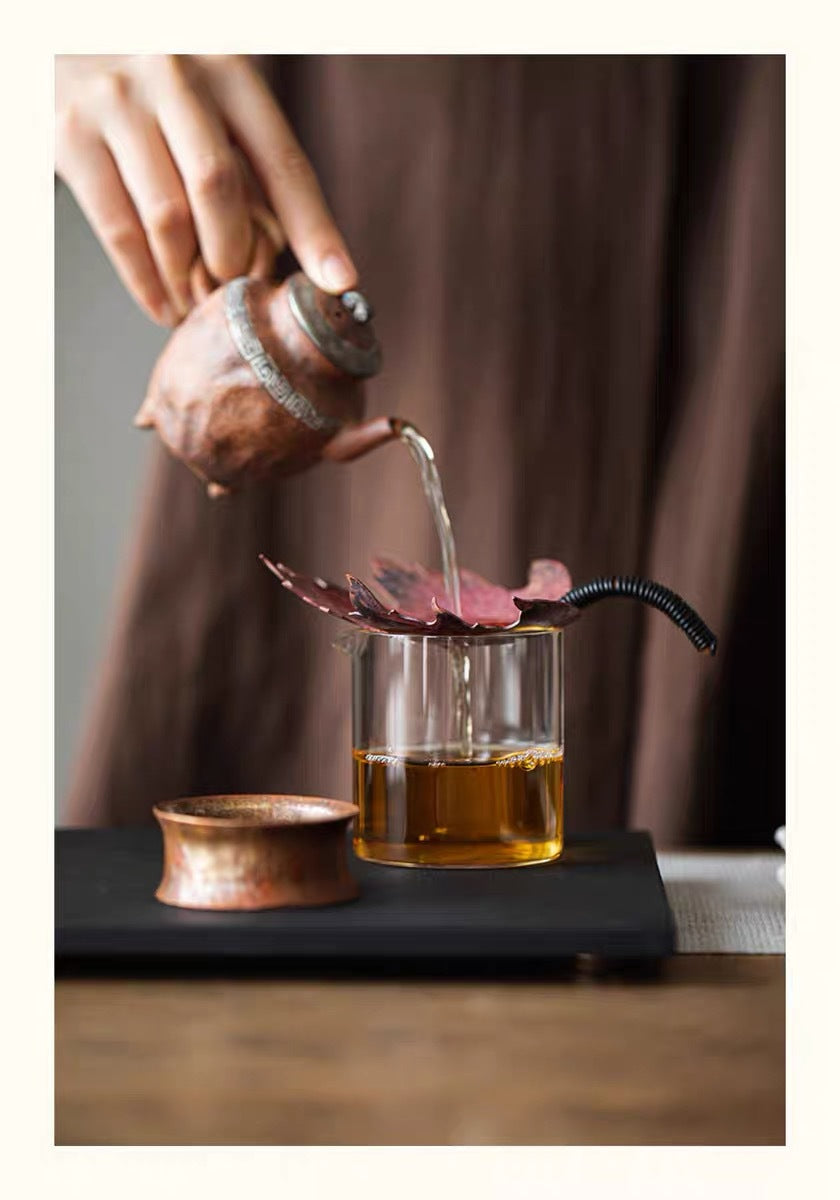 This is a copper tea filter tea funnel