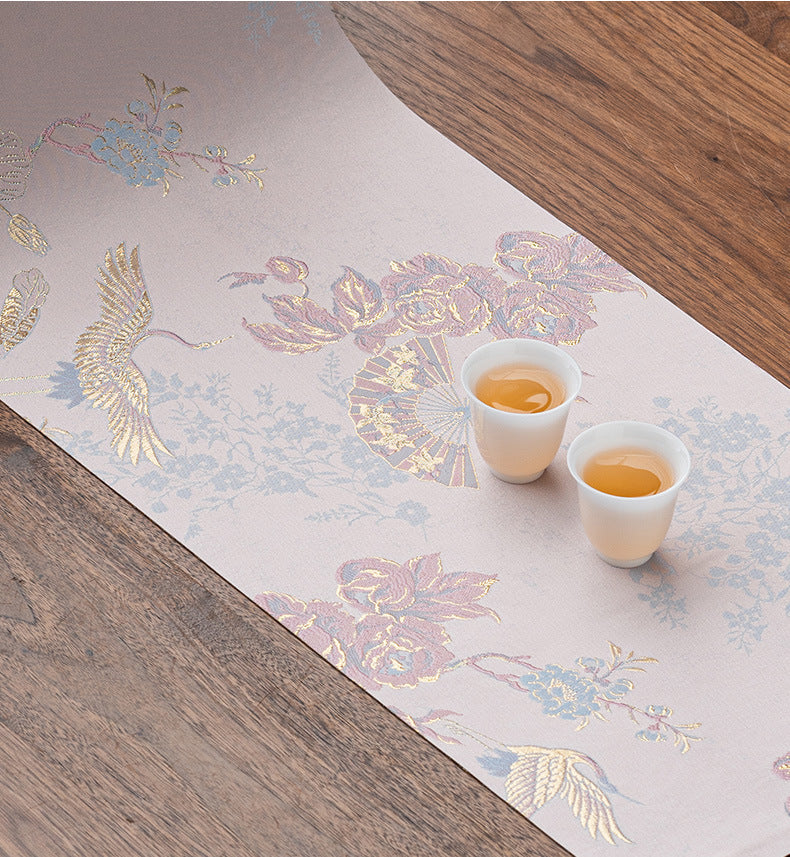 This is a silk brocade tea mat.this is a waterproof table cloth