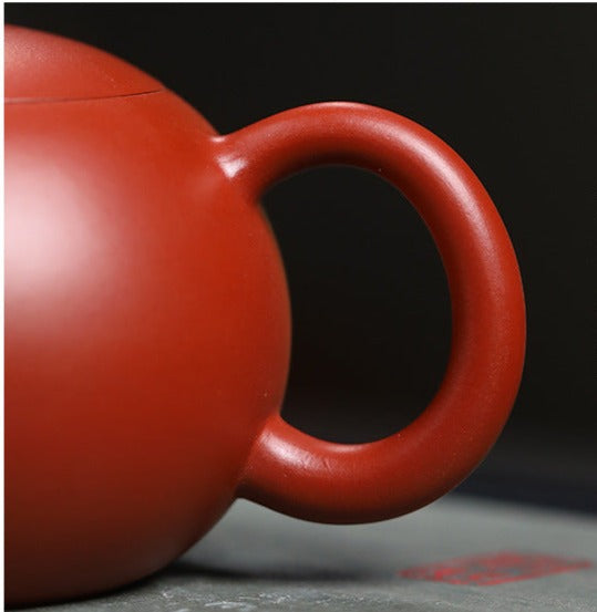 This is a pottery teapot.this is a Zhuni red clay teapot.