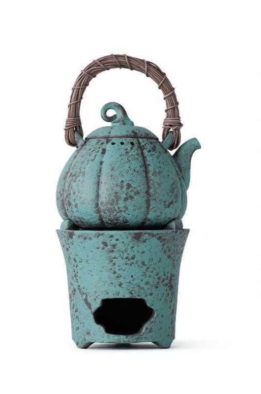 this is a pottery lifting kettle