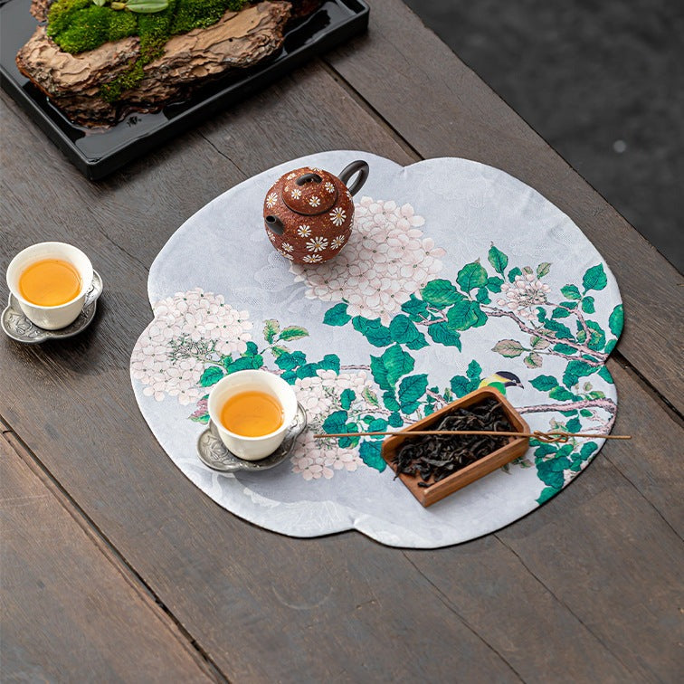 This is a silk brocade tea mat.this is a waterproof table cloth