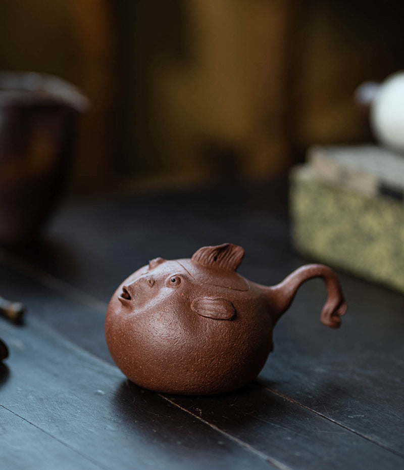 This is a Yixing teapot. this is Chinese yixing clay teapot