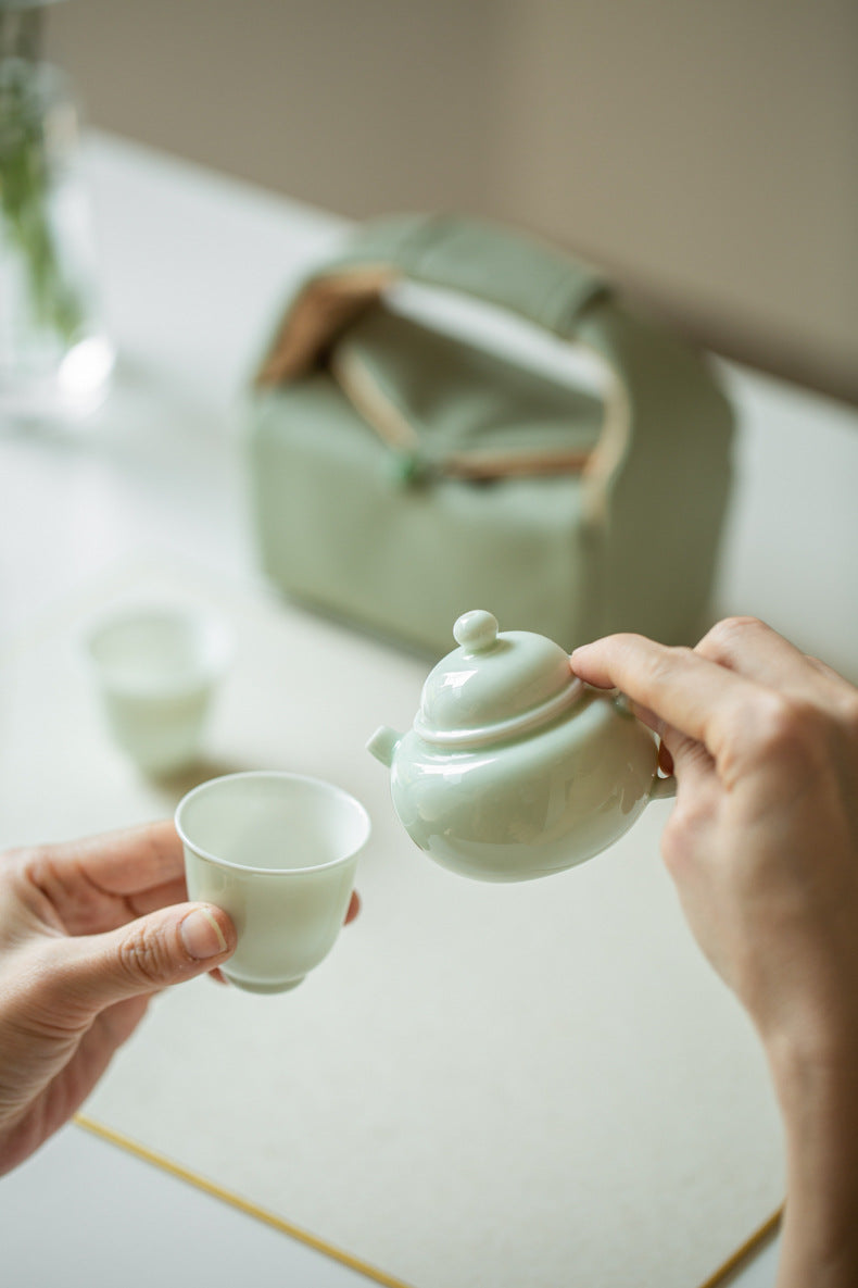 This is a ceramic teapot