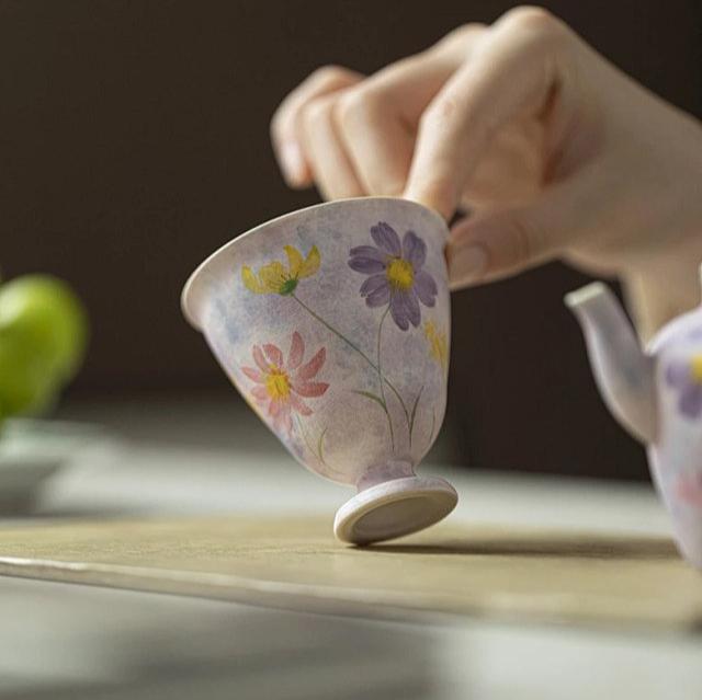 this is a purple ceramic teapot. this is Chinse kohiki teapot