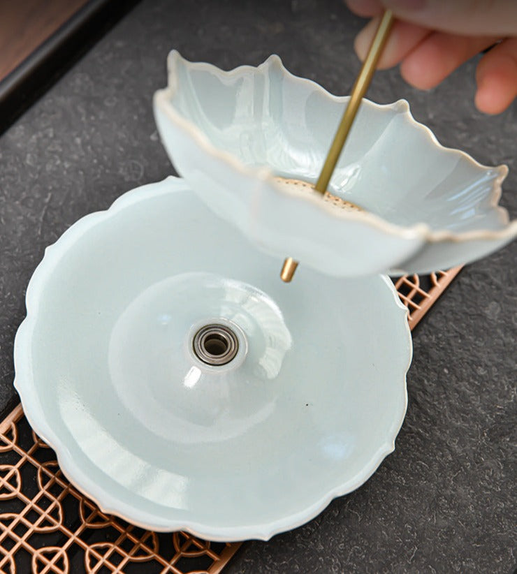 This is a ceramic tea filter tea funnel