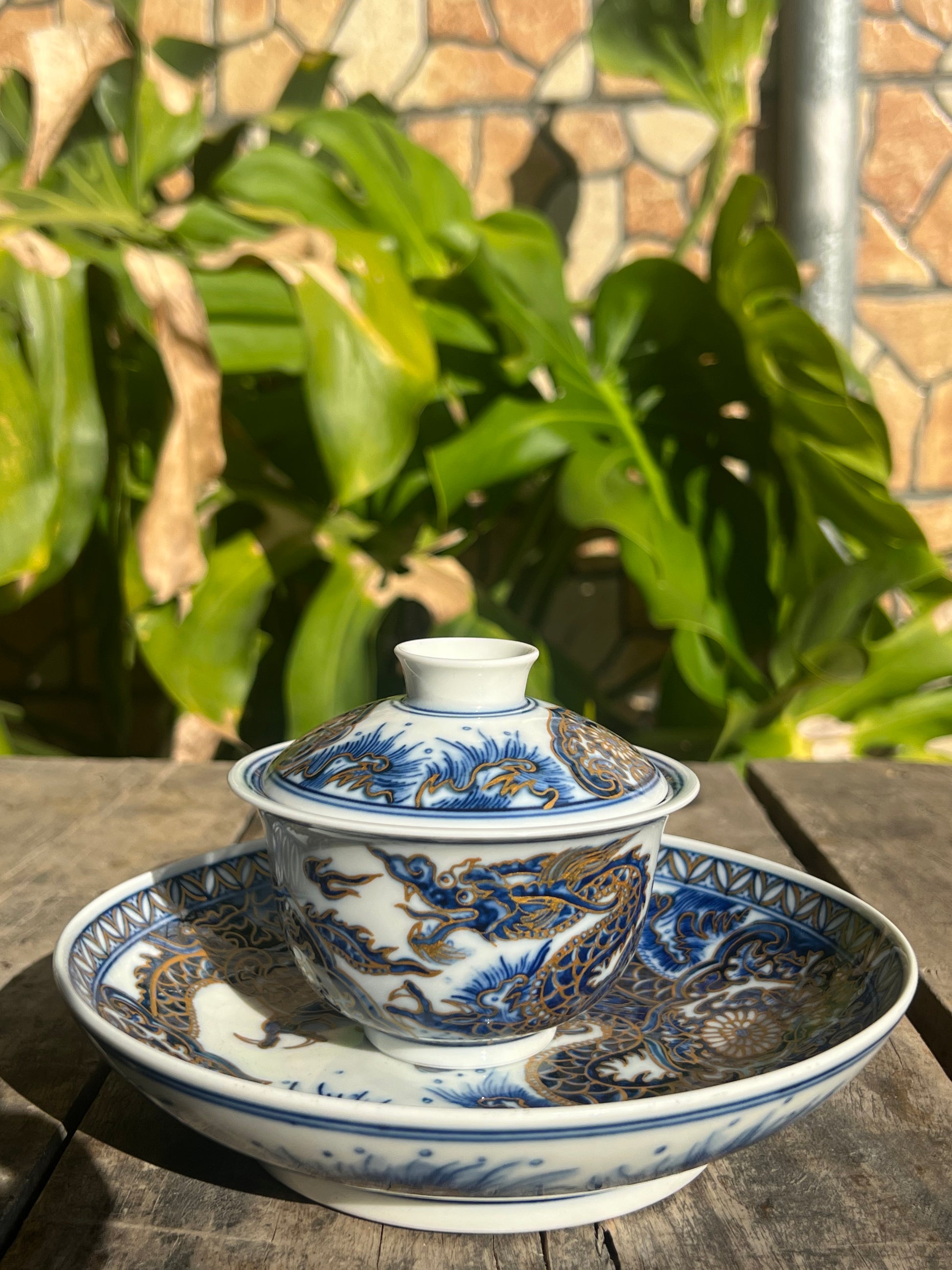 This is a Chinese Jingdezhen blue and white porcelain dragon teapot gaiwan