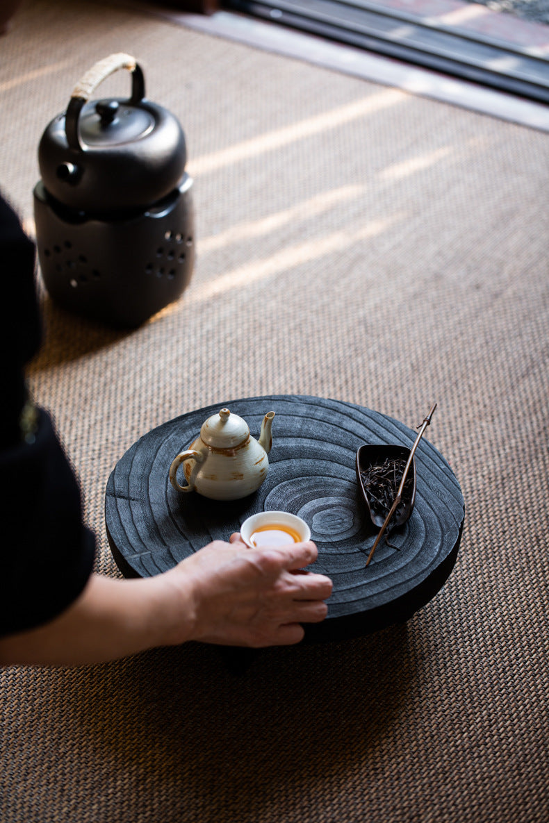 This is a black cedar tea tray tea boat.This is a wooden tea table.