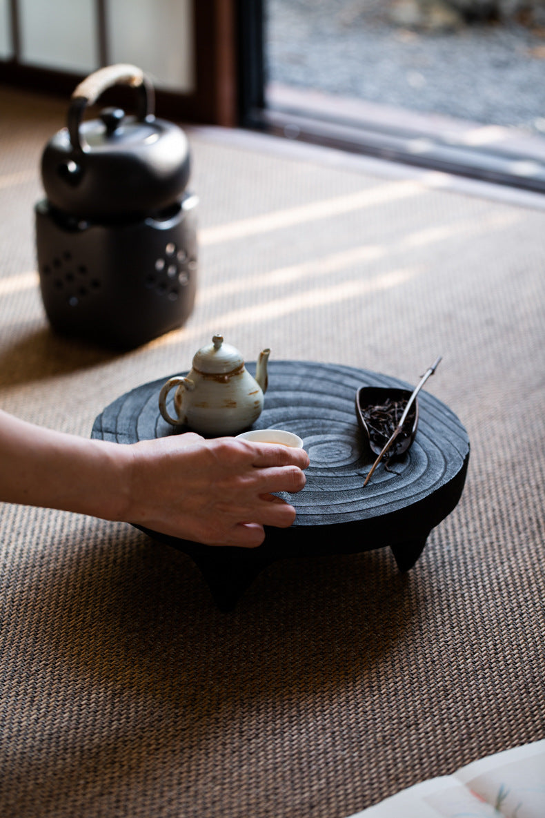 This is a black cedar tea tray tea boat.This is a wooden tea table.