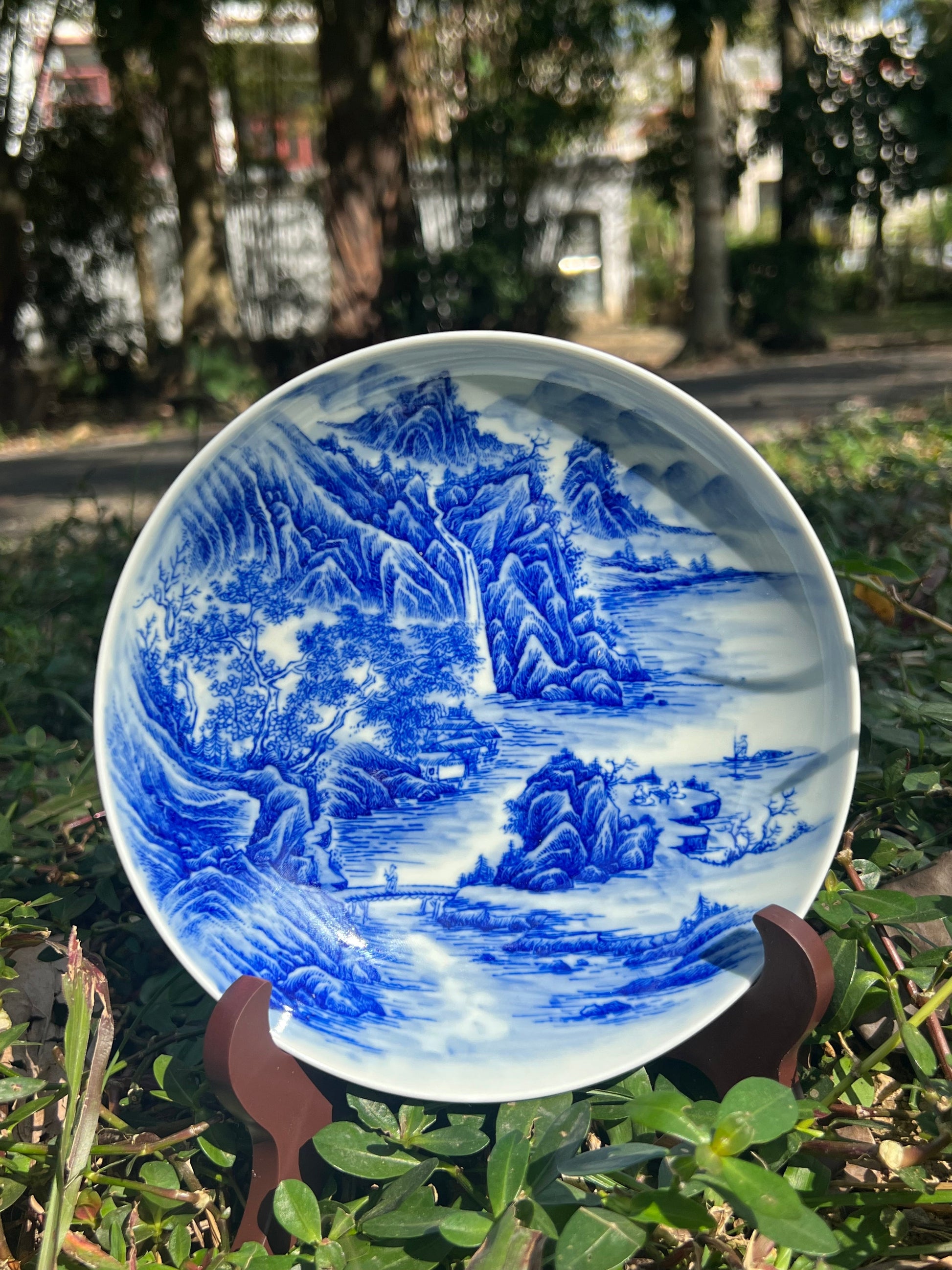 This is a Chinese Jingdezhen blue and white porcelain landscape teapot gaiwan