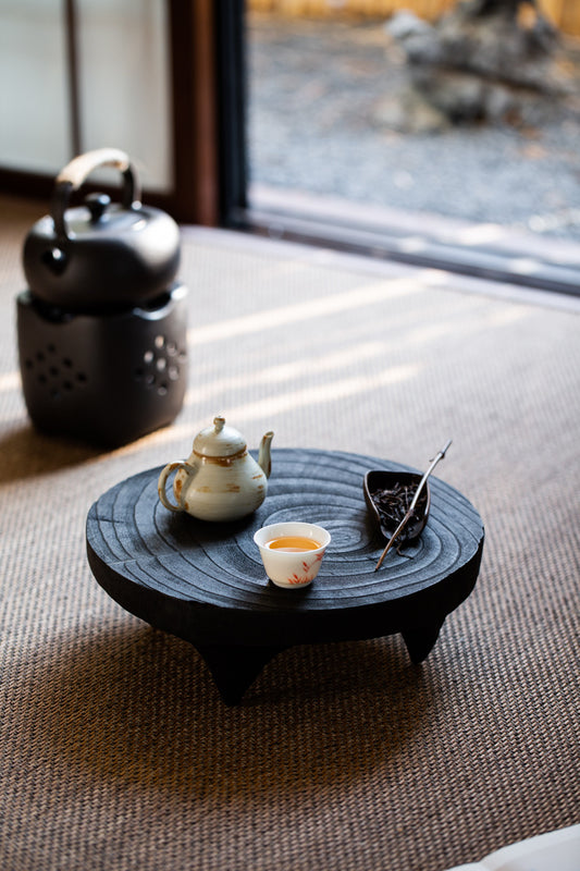 This is a black cedar tea tray tea boat.This is a wooden tea table.