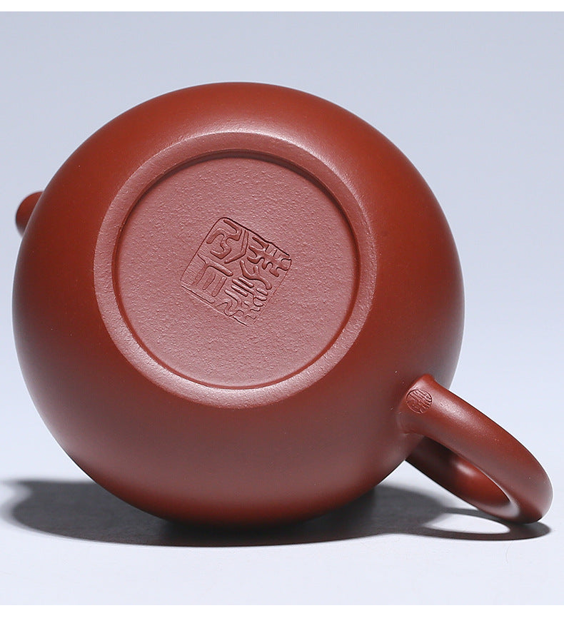 This is a pottery teapot.this is a Zhuni red clay teapot.