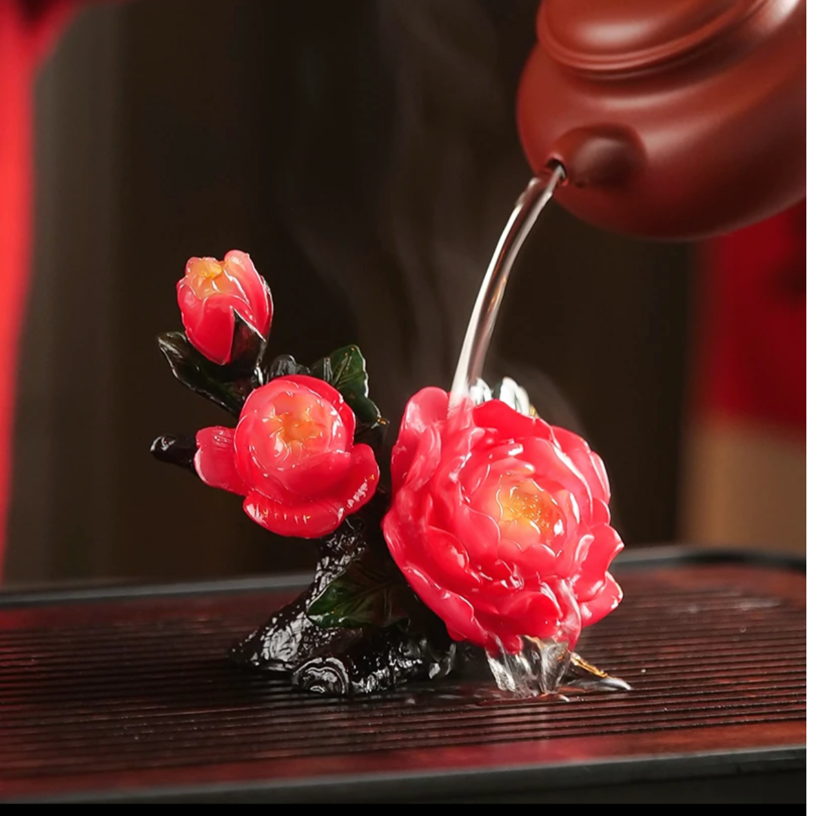 This is a color changing peony flower teapet.this is a resin teapet