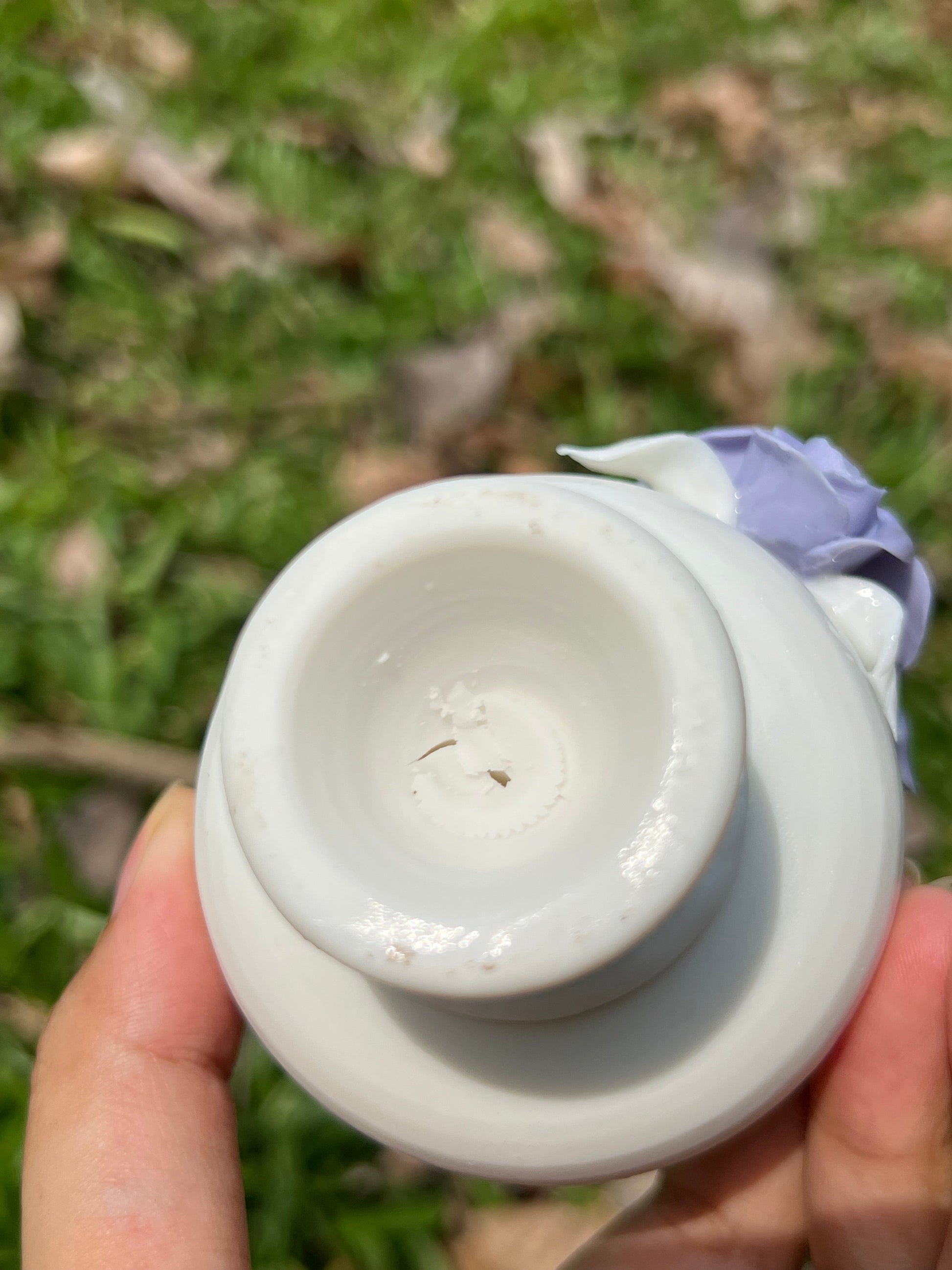 this is a woodfired white fine pottery flower teacup