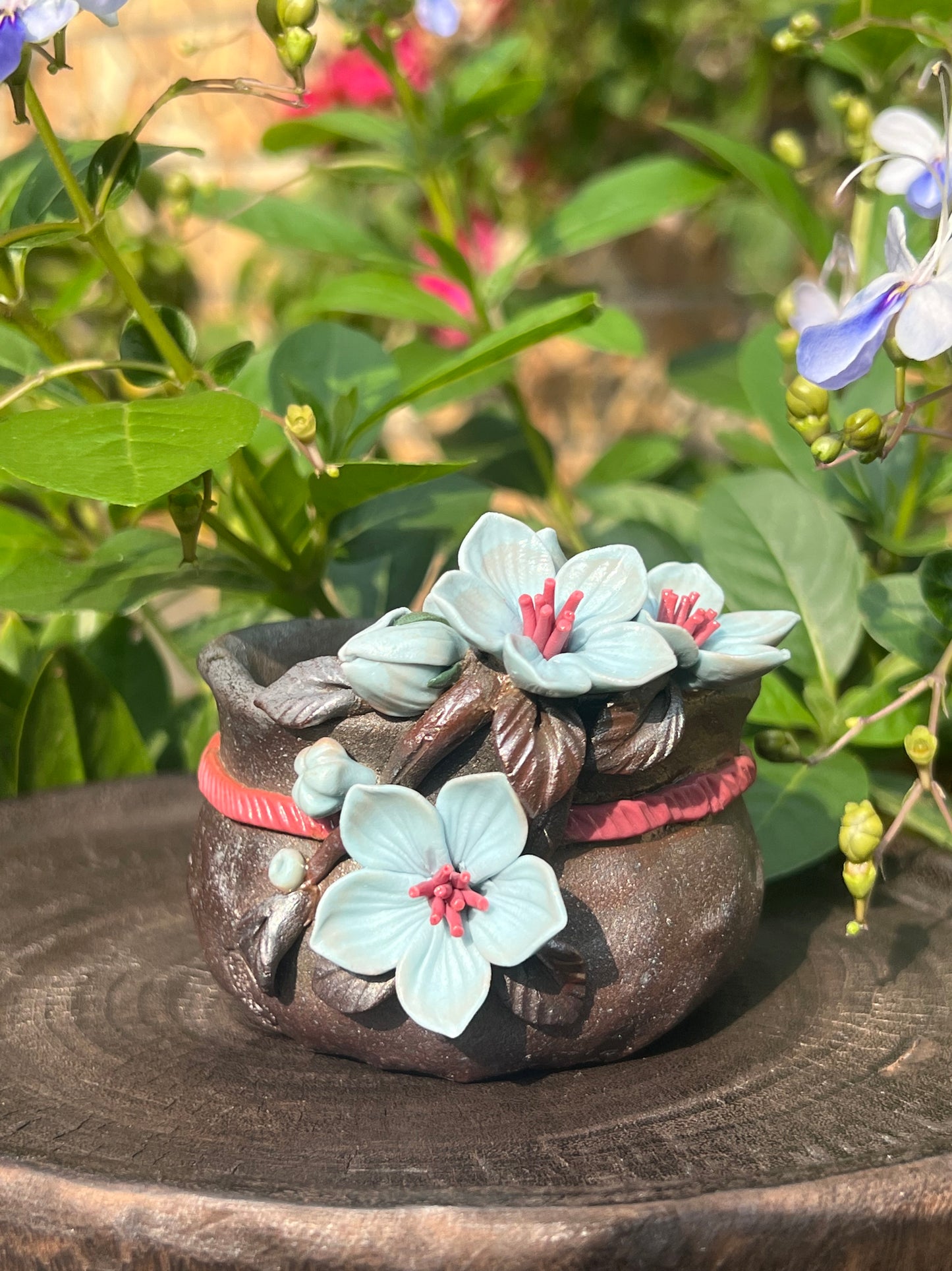 This is a woodfired tietai pottery flower teacup