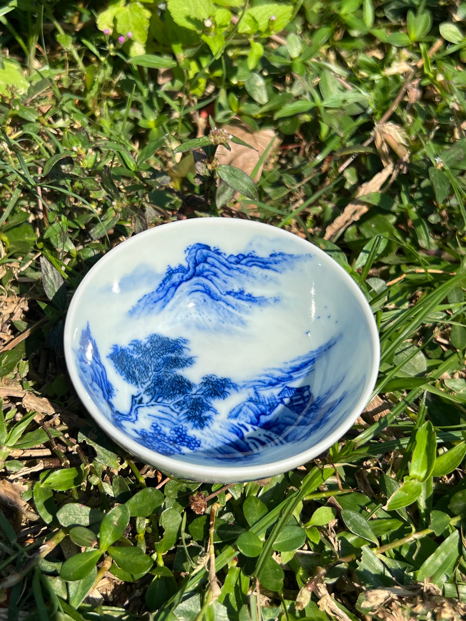 This is a Chinese Jingdezhen blue and white porcelain landscape teacup