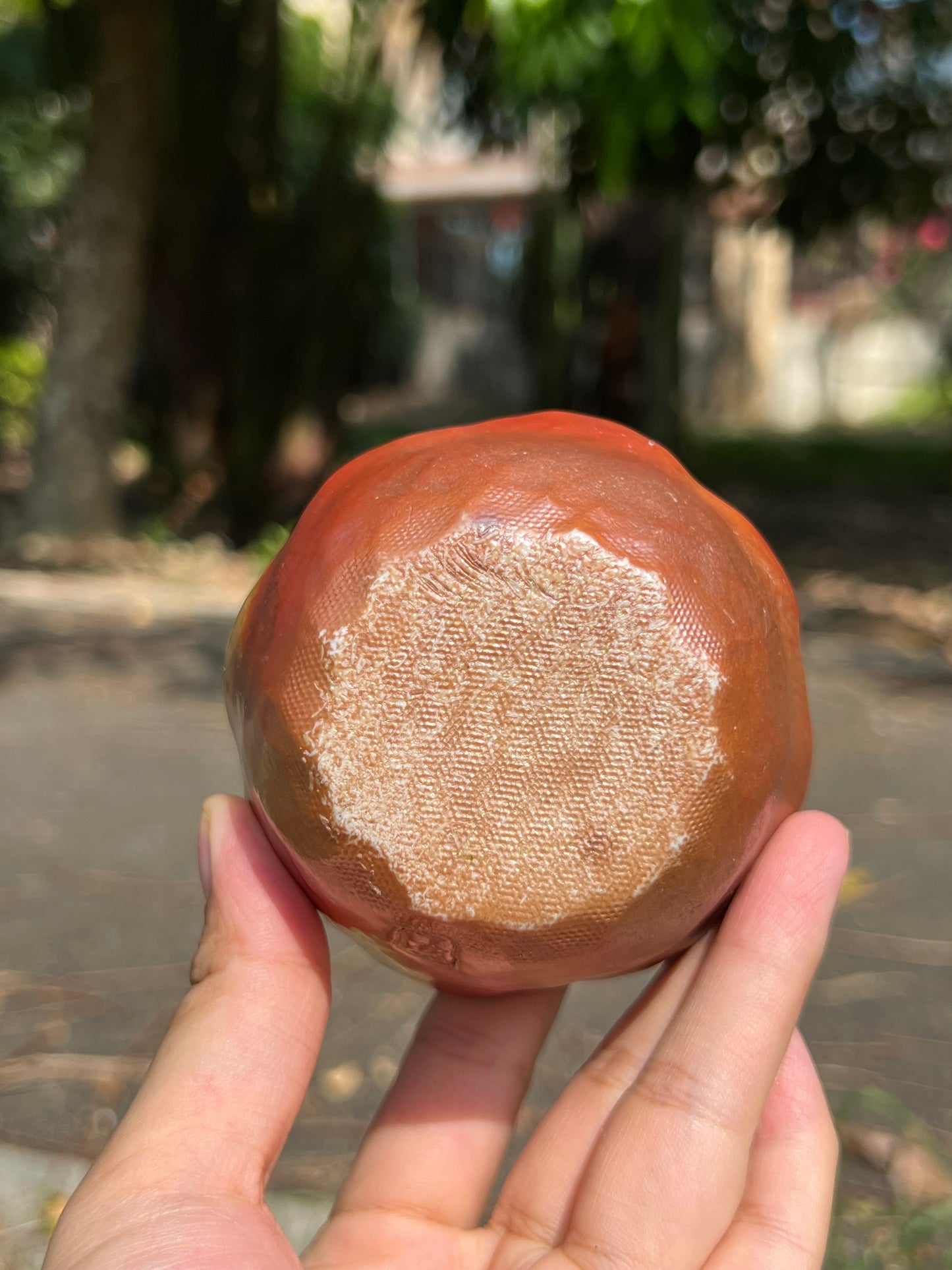 This is a woodfired pottery flower teacup