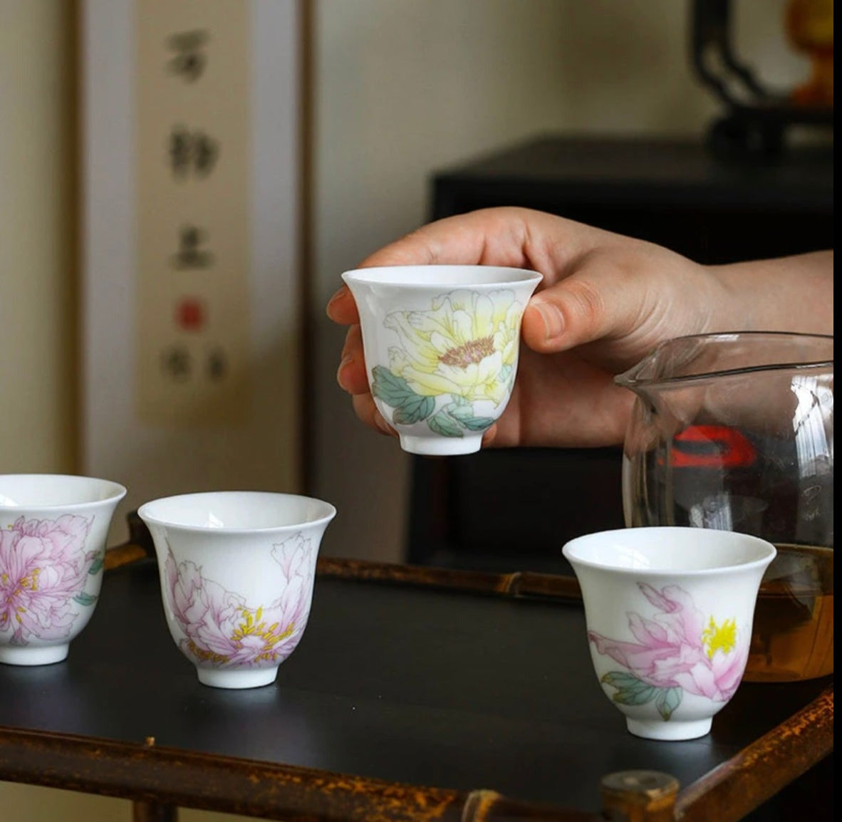 This is a Chinese Jingdezhen pastel flower teacup