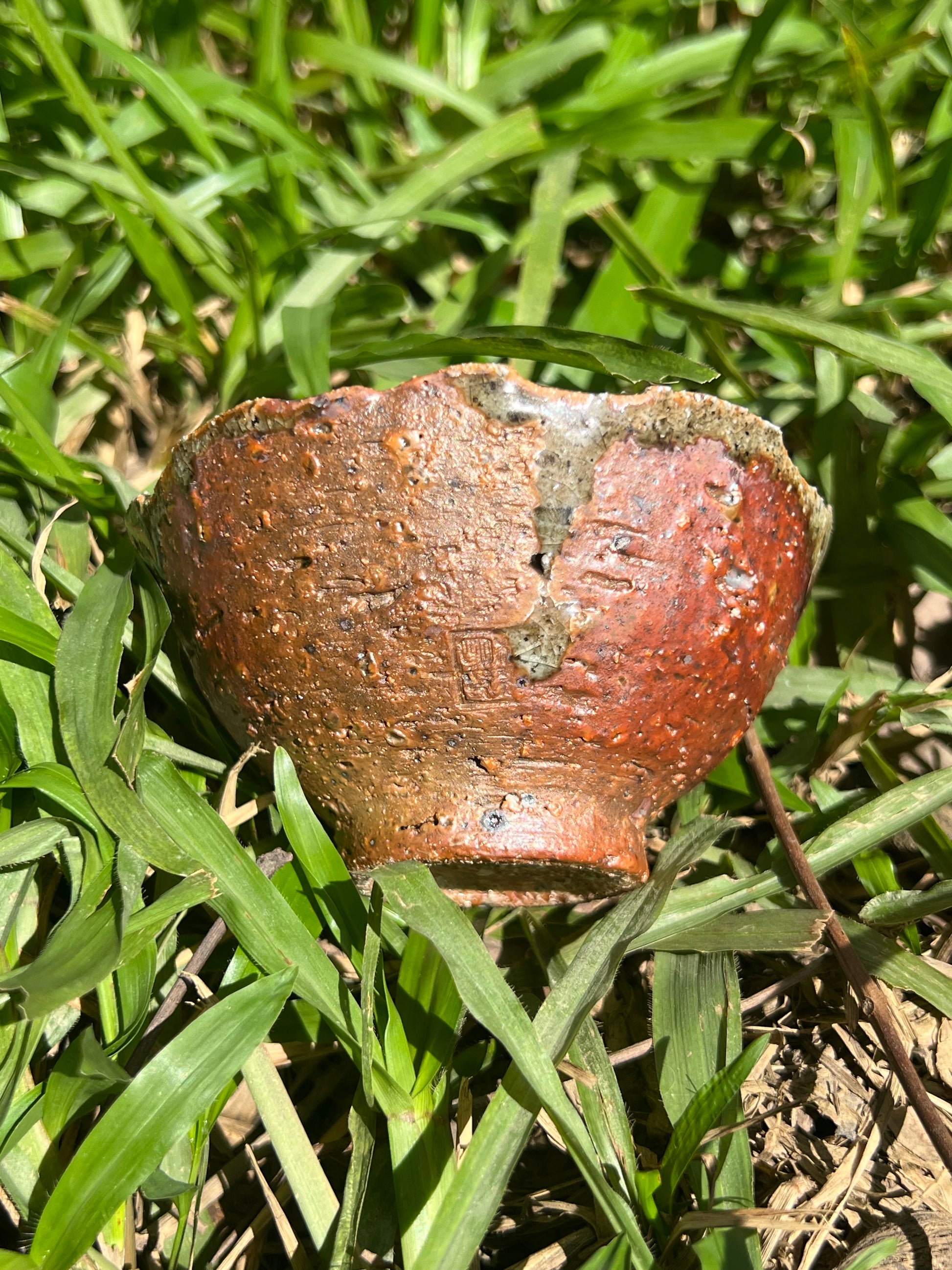 This is a woodfired pottery flower teacup