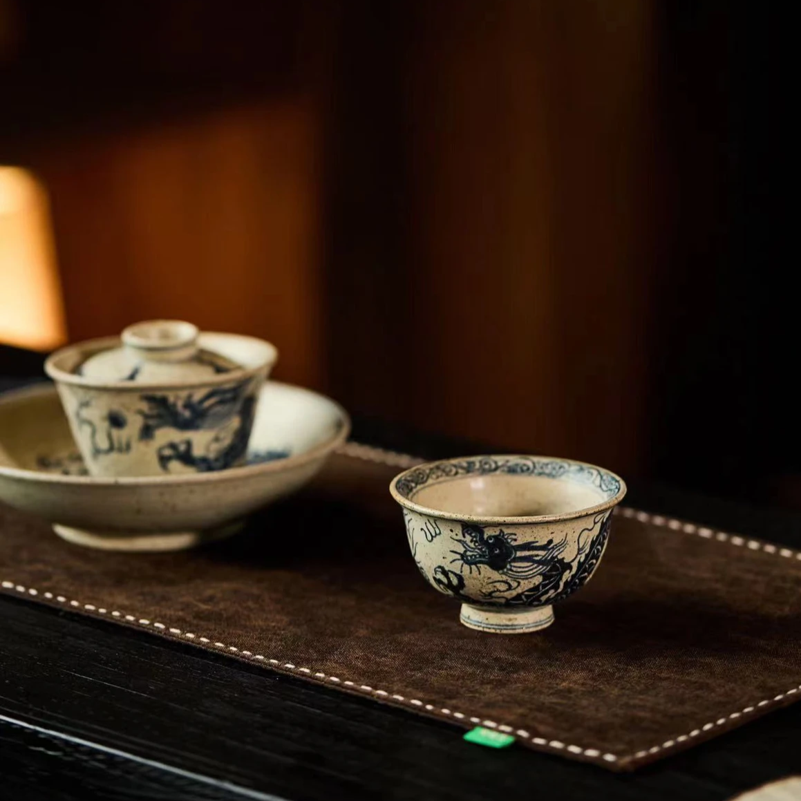 This is a Chinese Jingdezhen blue and white pottery dragon teapot gaiwan