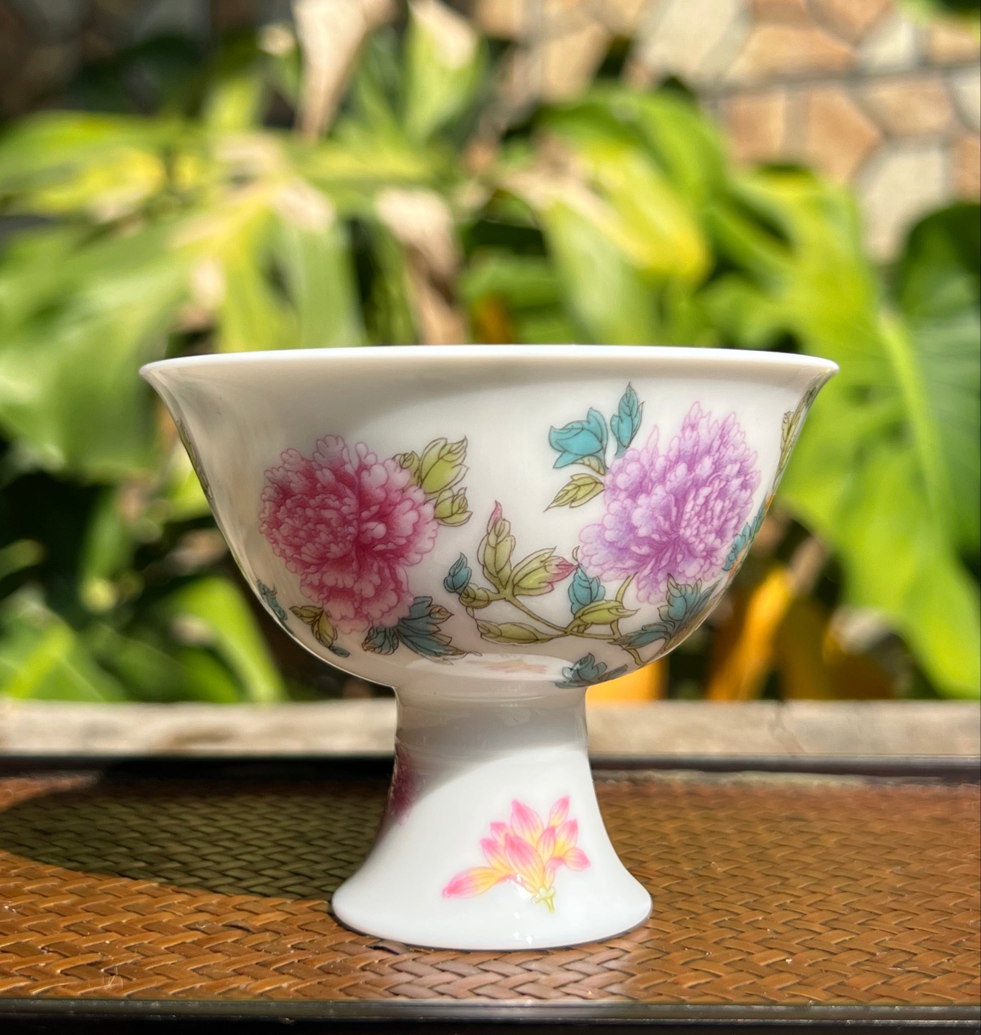 This is a Chinese Jingdezhen enamel flower teacup