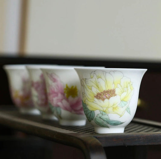 This is a Chinese Jingdezhen pastel flower teacup