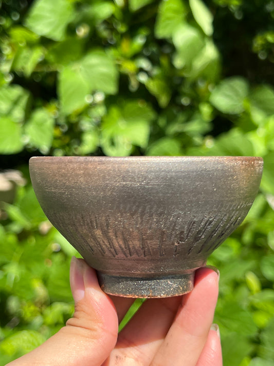 This is a woodfired tietai pottery teacup