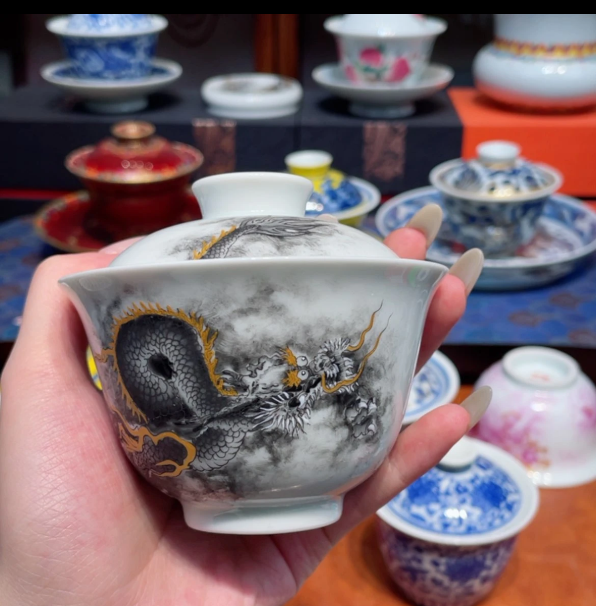 this is a Chinese Jingdezhen ceramic dragon teapot gaiwan