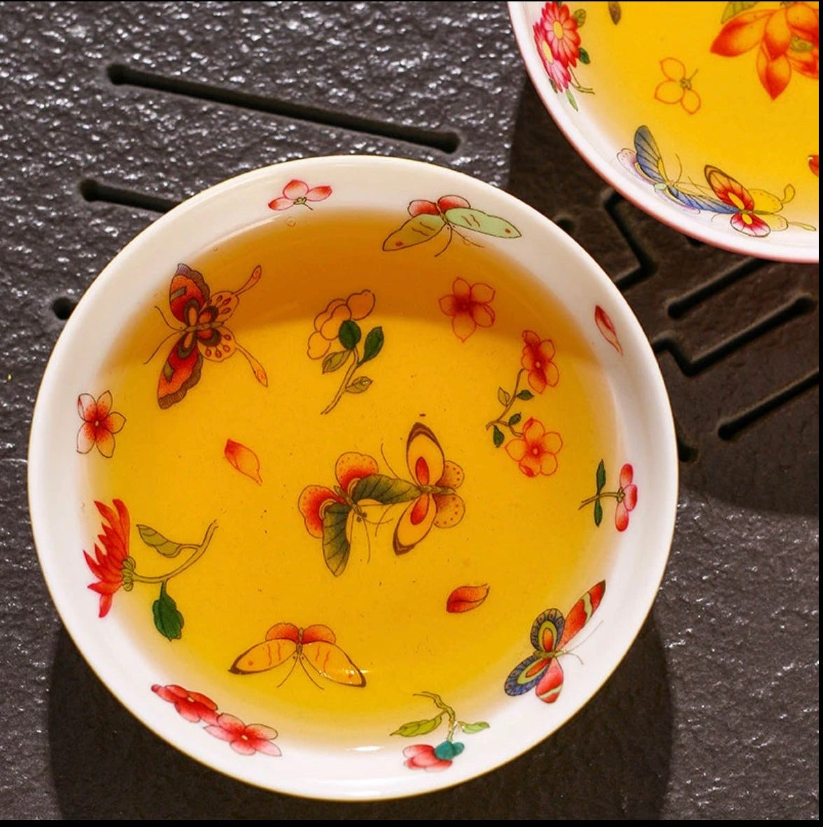 This is a Chinese Jingdezhen pastel flower teacup