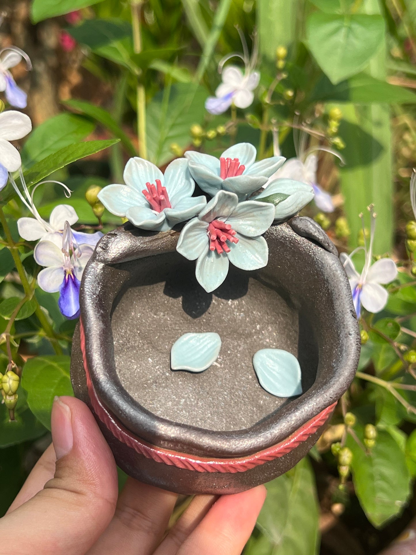 This is a woodfired tietai pottery flower teacup