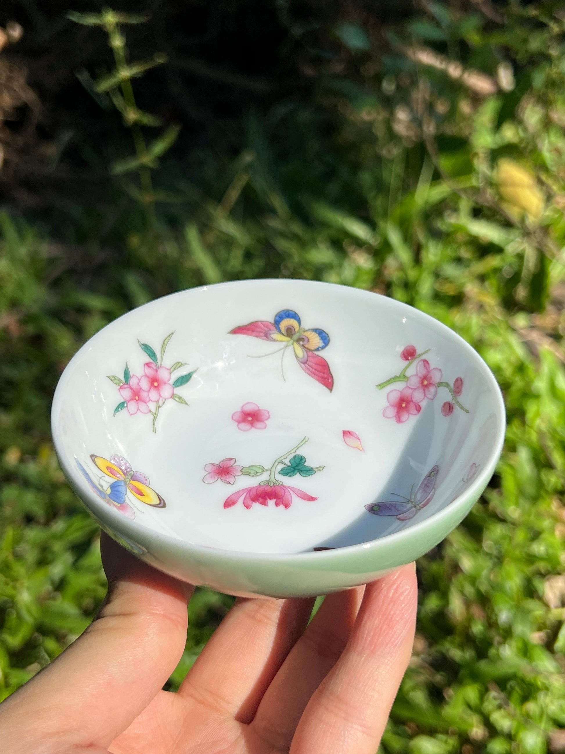 this is Chinese Jingdezhen enamel butterfly teacup. this is a ceramic teacup