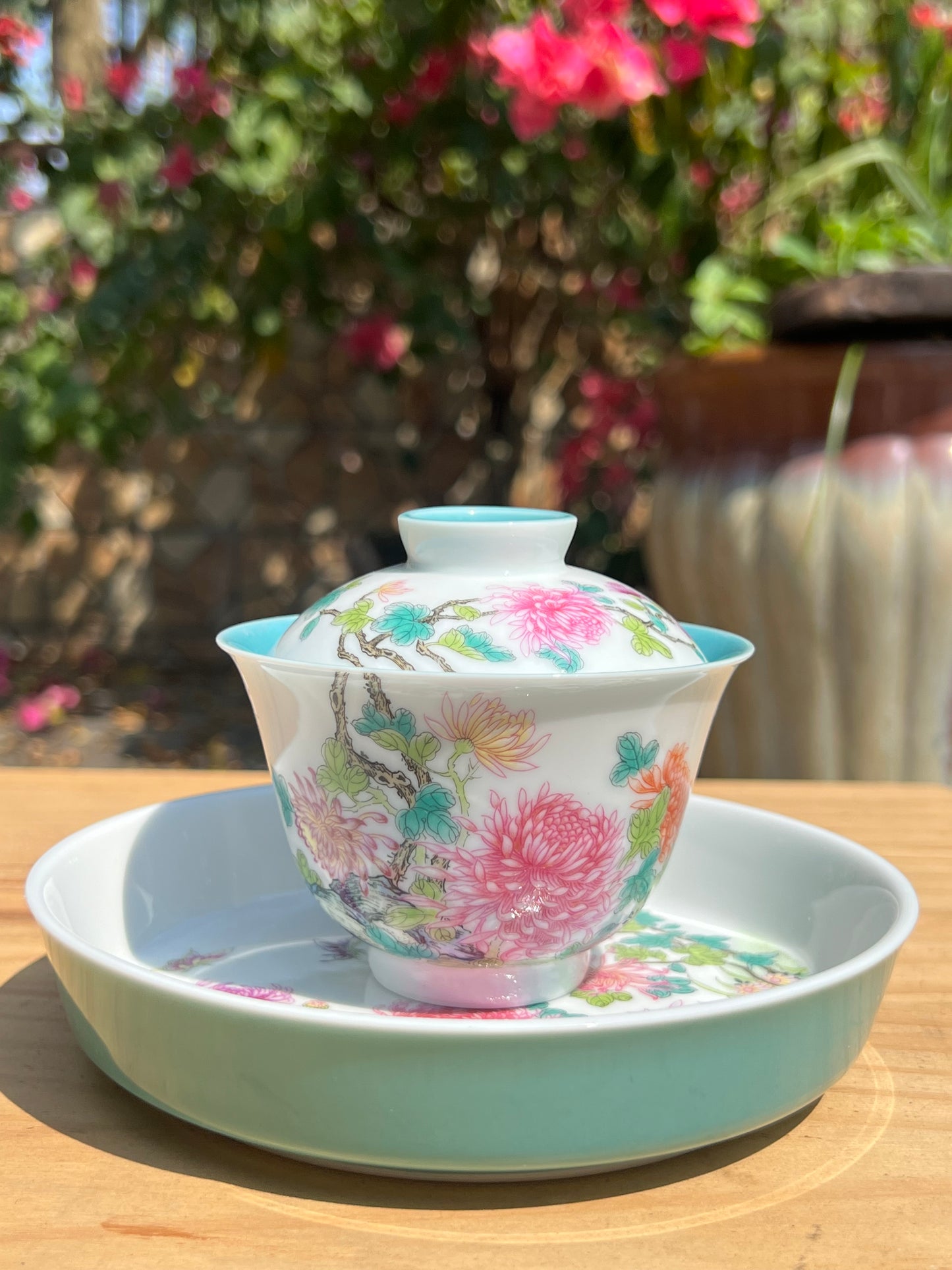 This is a Chinese Jingdezhen enamel flower teapot gaiwan