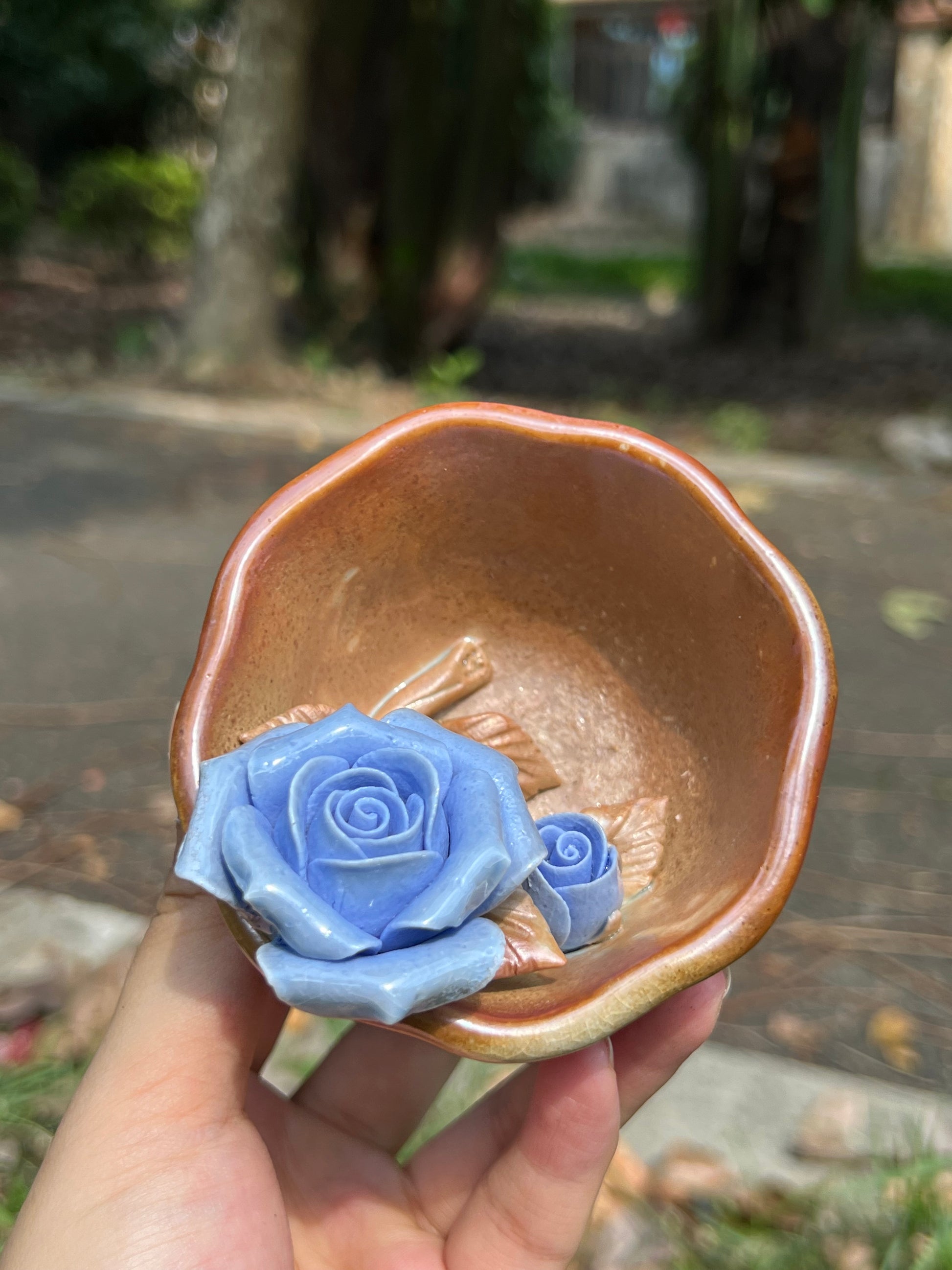 This is a woodfired pottery flower teacup