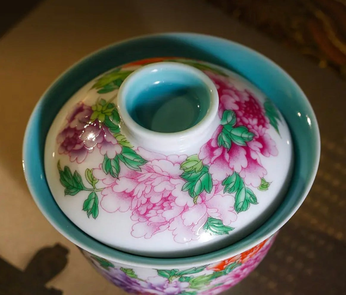 This is a Chinese Jingdezhen enamel flower teapot gaiwan