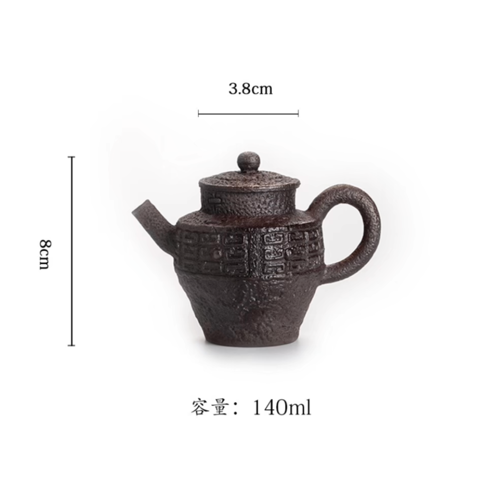 this is a pottery teapot. this is a purple clay teapot