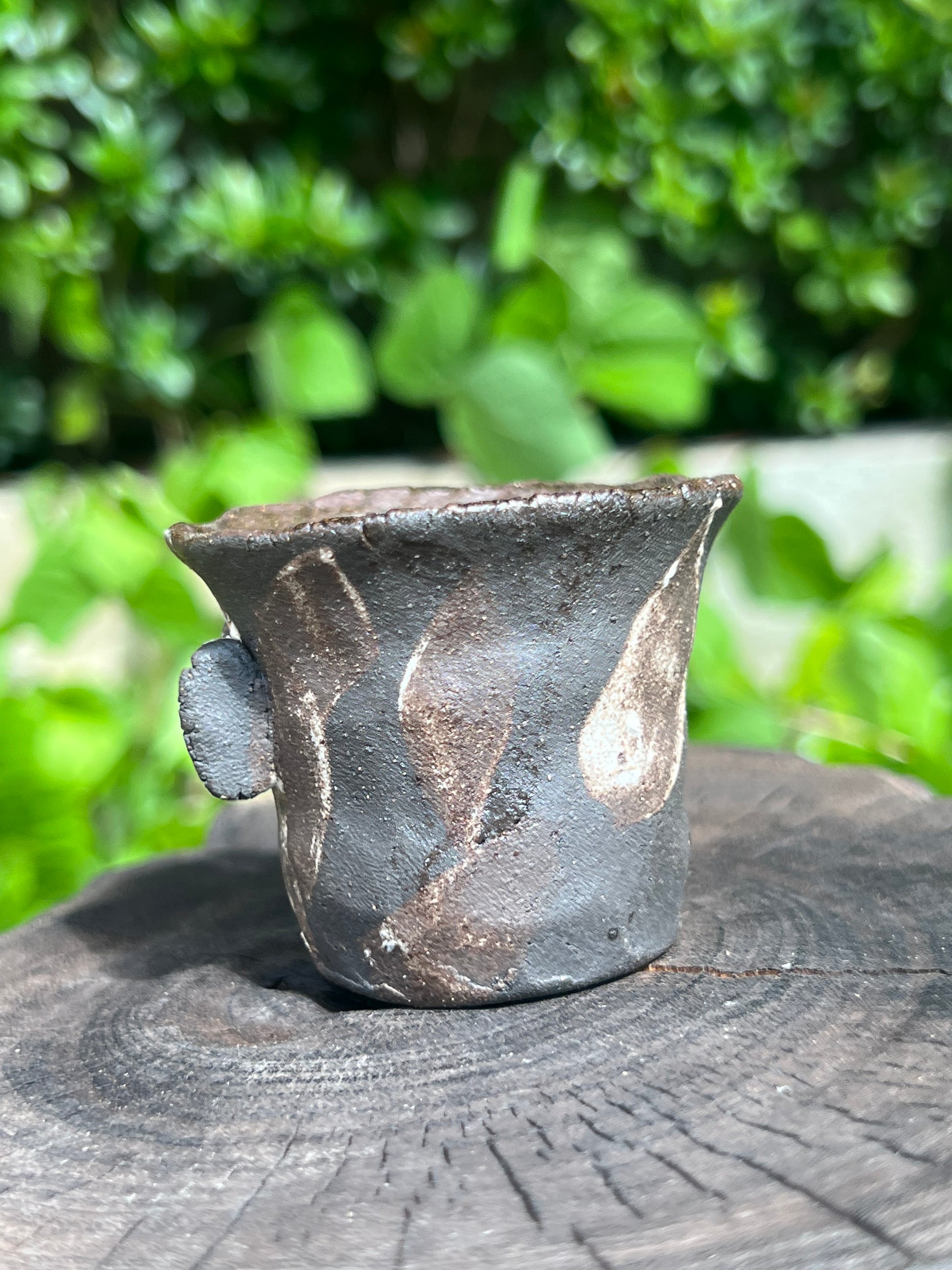 This is a pottery teacup