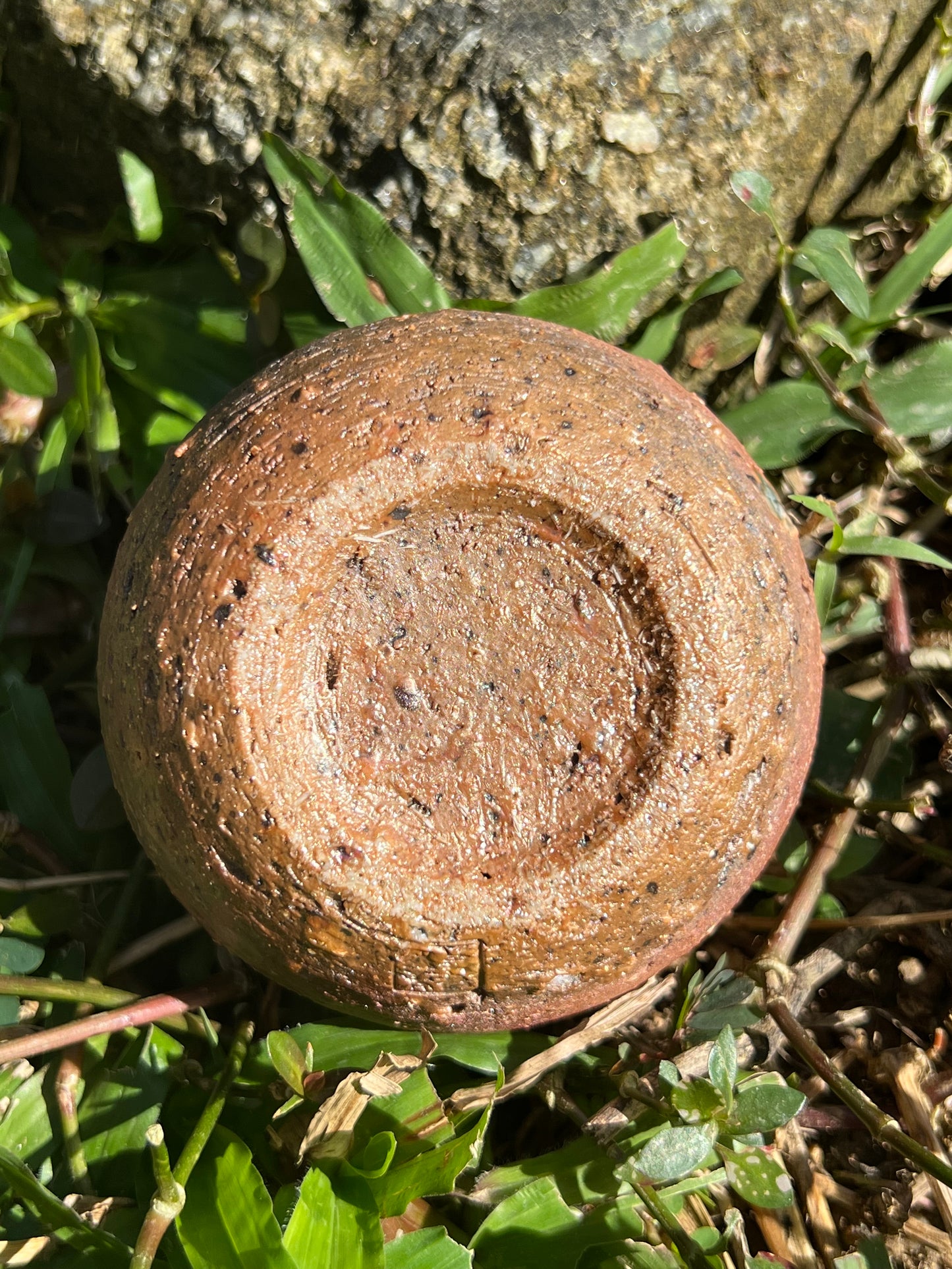 This is a woodfired pottery flower teacup