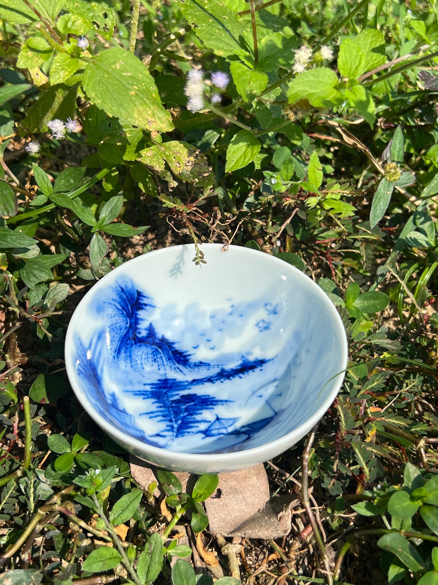 This is a Chinese Jingdezhen blue and white porcelain landscape teacup