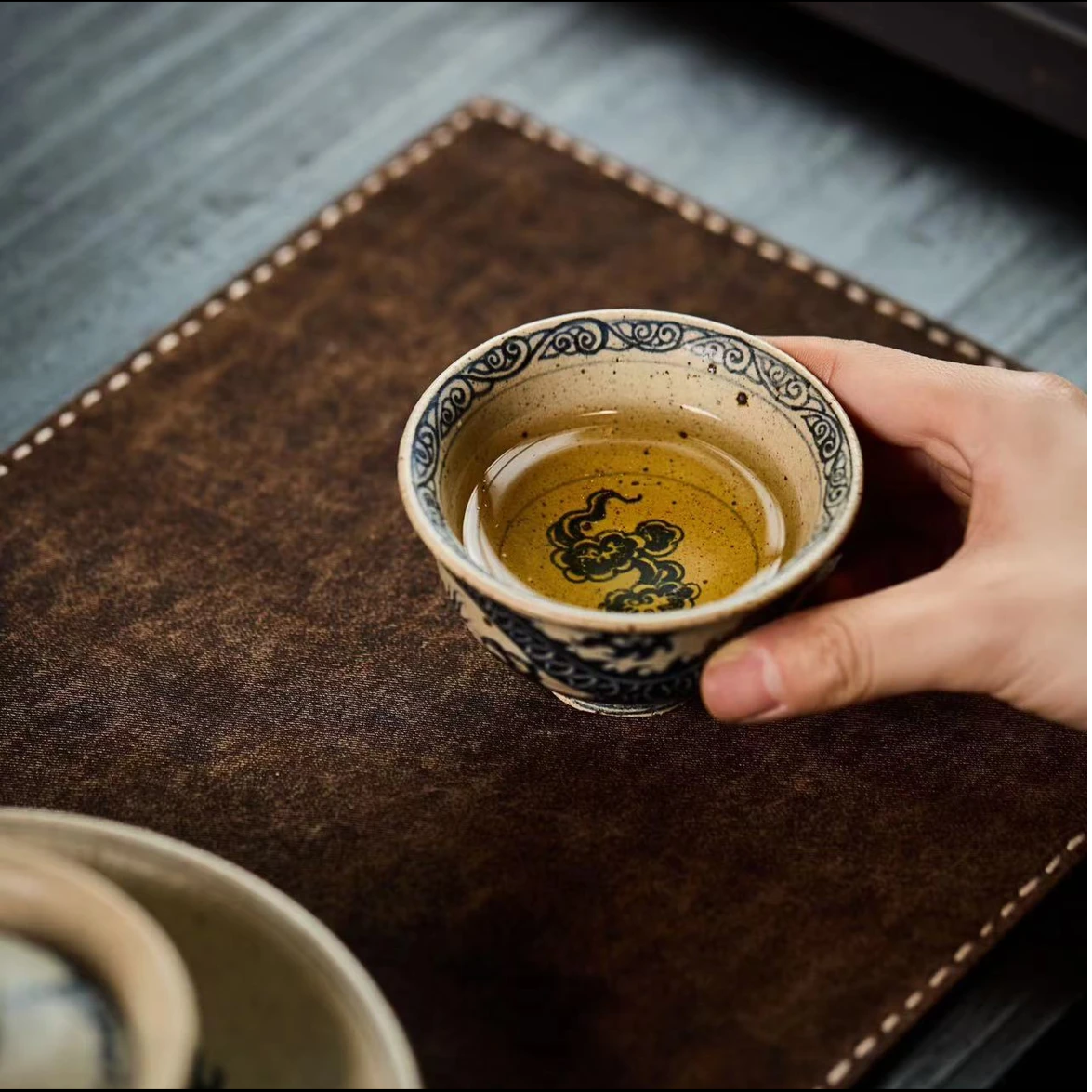 this is a Chinese Jingdezhen blue and white pottery dragon teacup