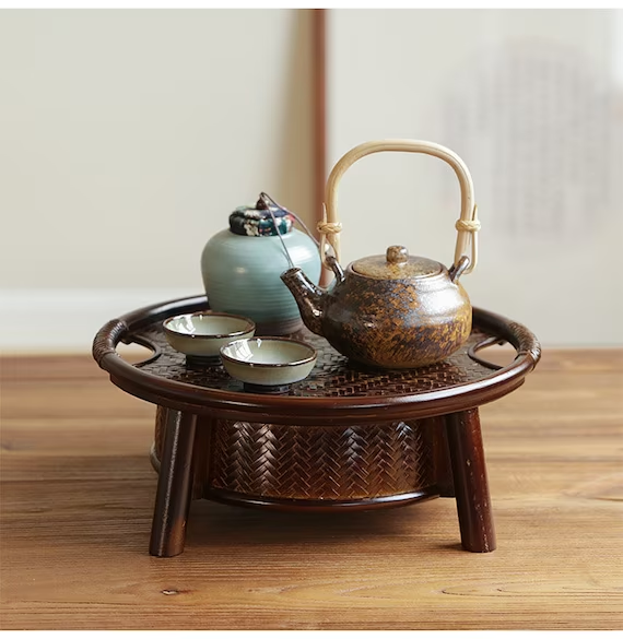 This is a bamboo weaving storage tea table.this is a black tea table 