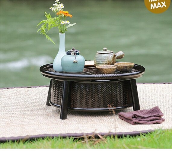 This is a bamboo weaving storage tea table.this is a black tea table 