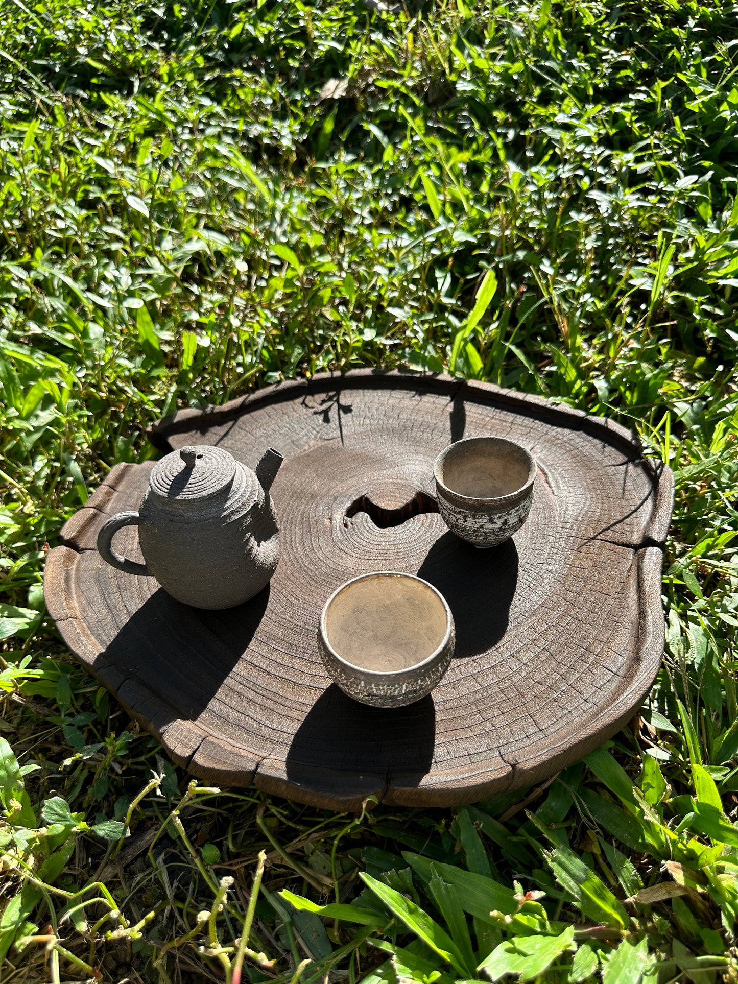 This is a black cedar tea tray tea boat.This is a wooden tea table.