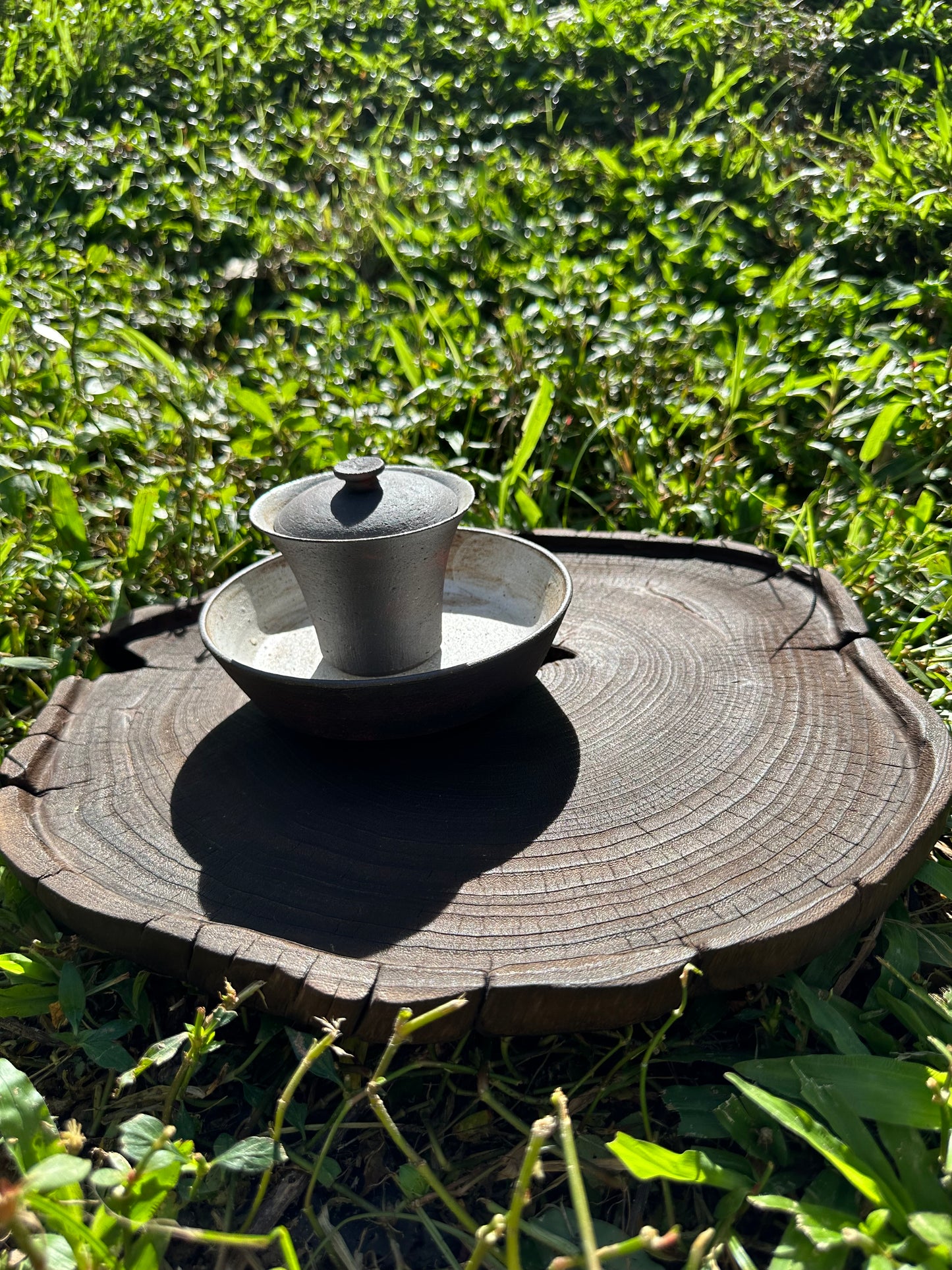 This is a black cedar tea tray tea boat.This is a wooden tea table.