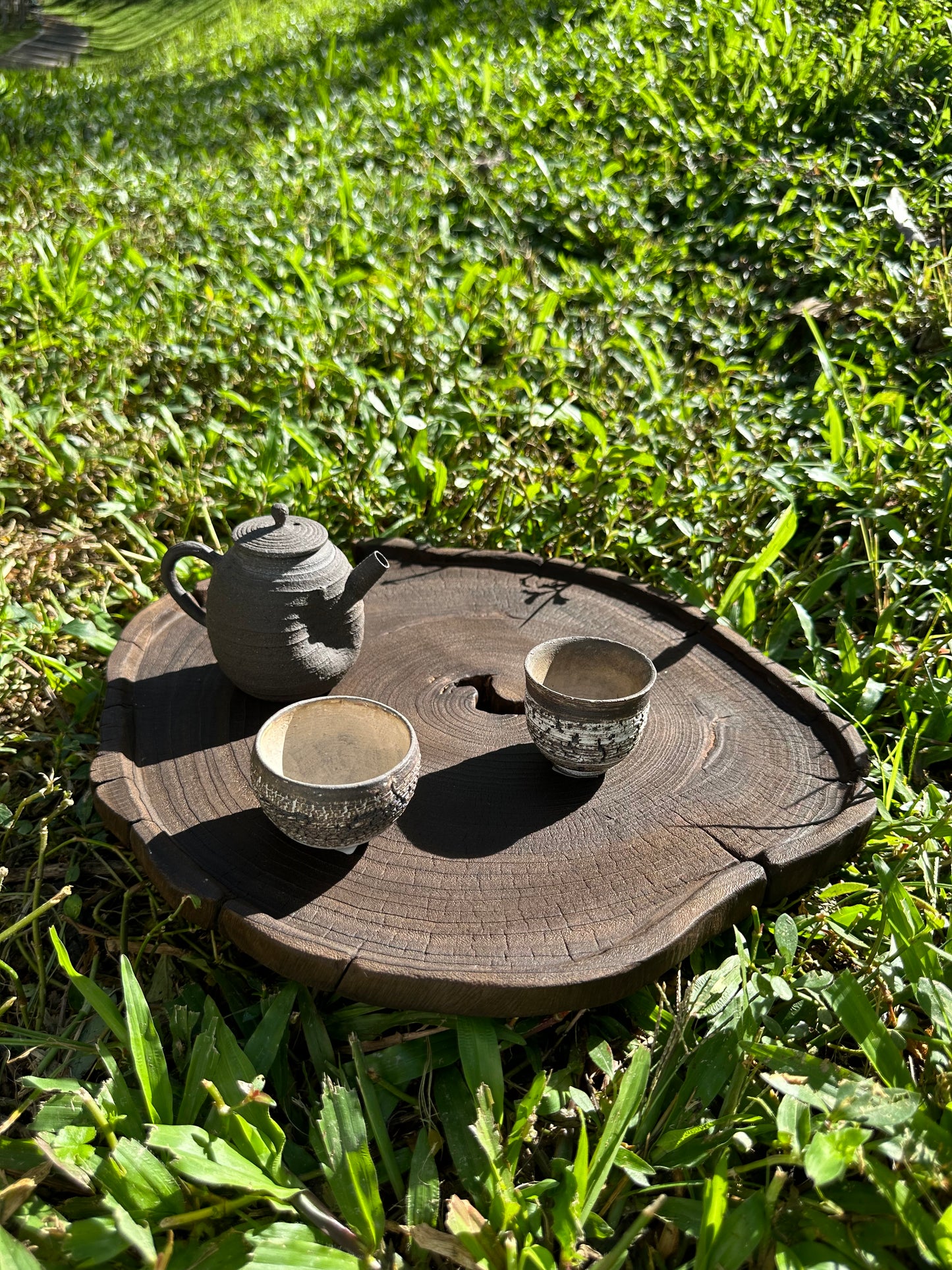 This is a black cedar tea tray tea boat.This is a wooden tea table.