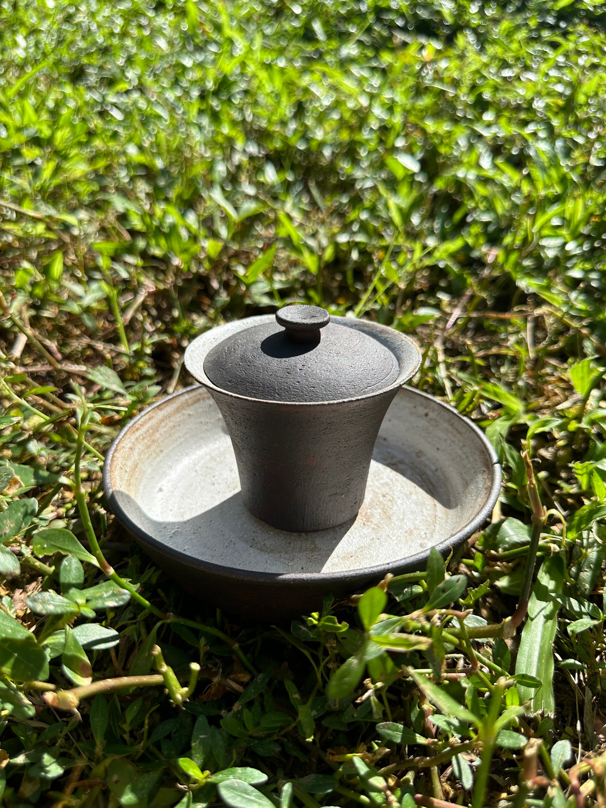 this is a pottery teapot gaiwan