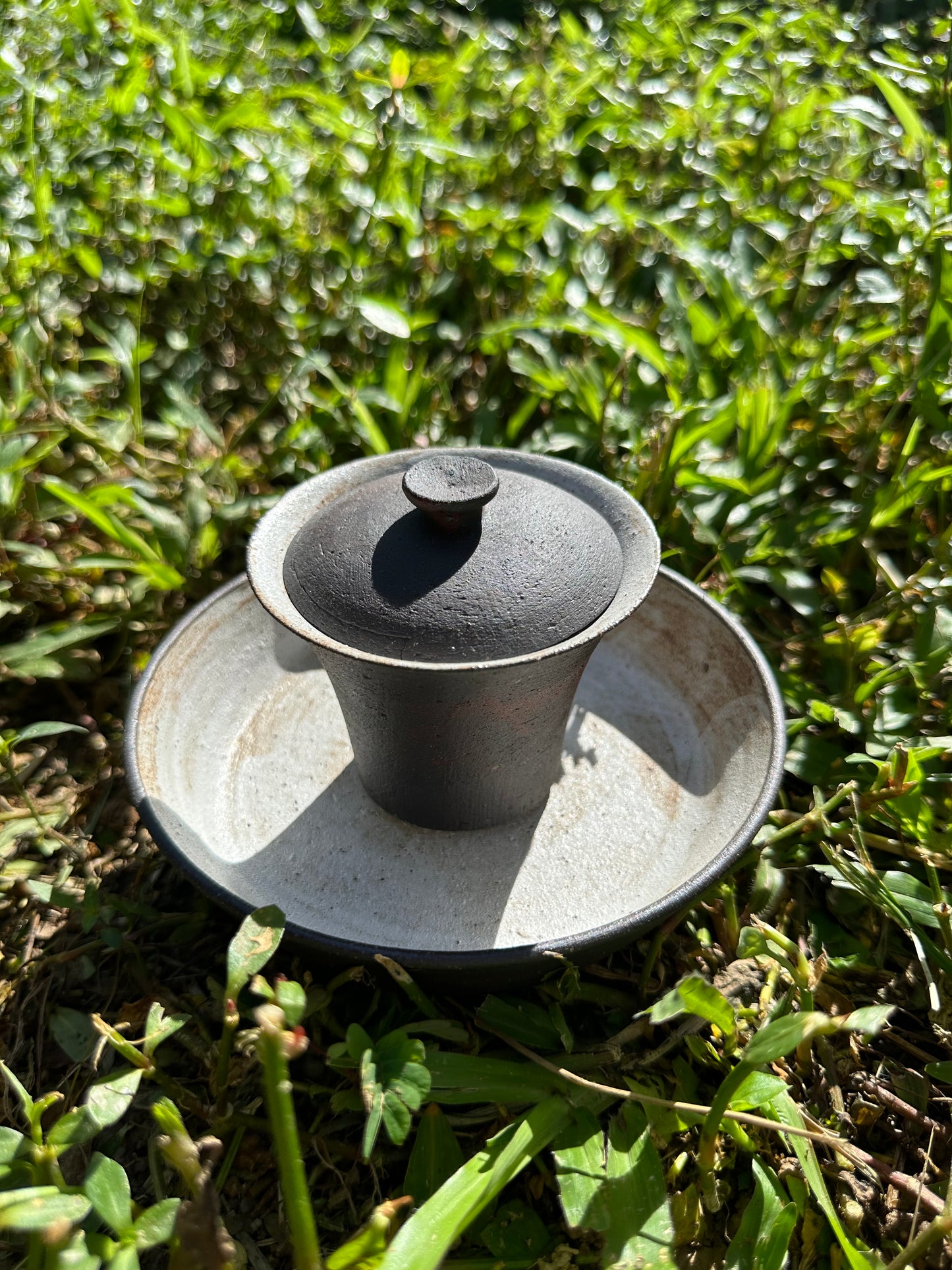 this is a pottery teapot gaiwan