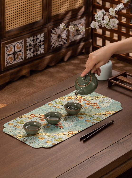 This is a silk brocade tea mat.this is a waterproof table cloth