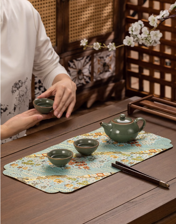 This is a silk brocade tea mat.this is a waterproof table cloth