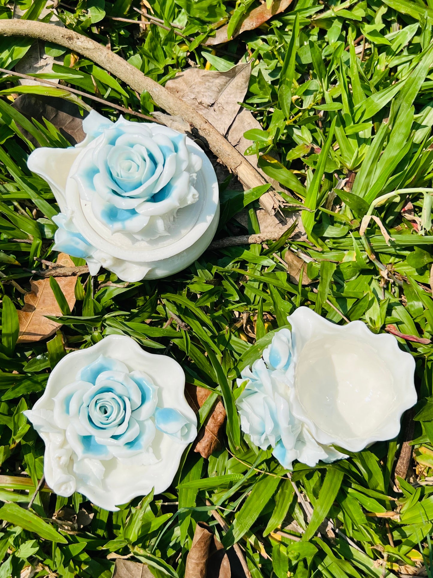 this is a woodfired white fine pottery flower teacup