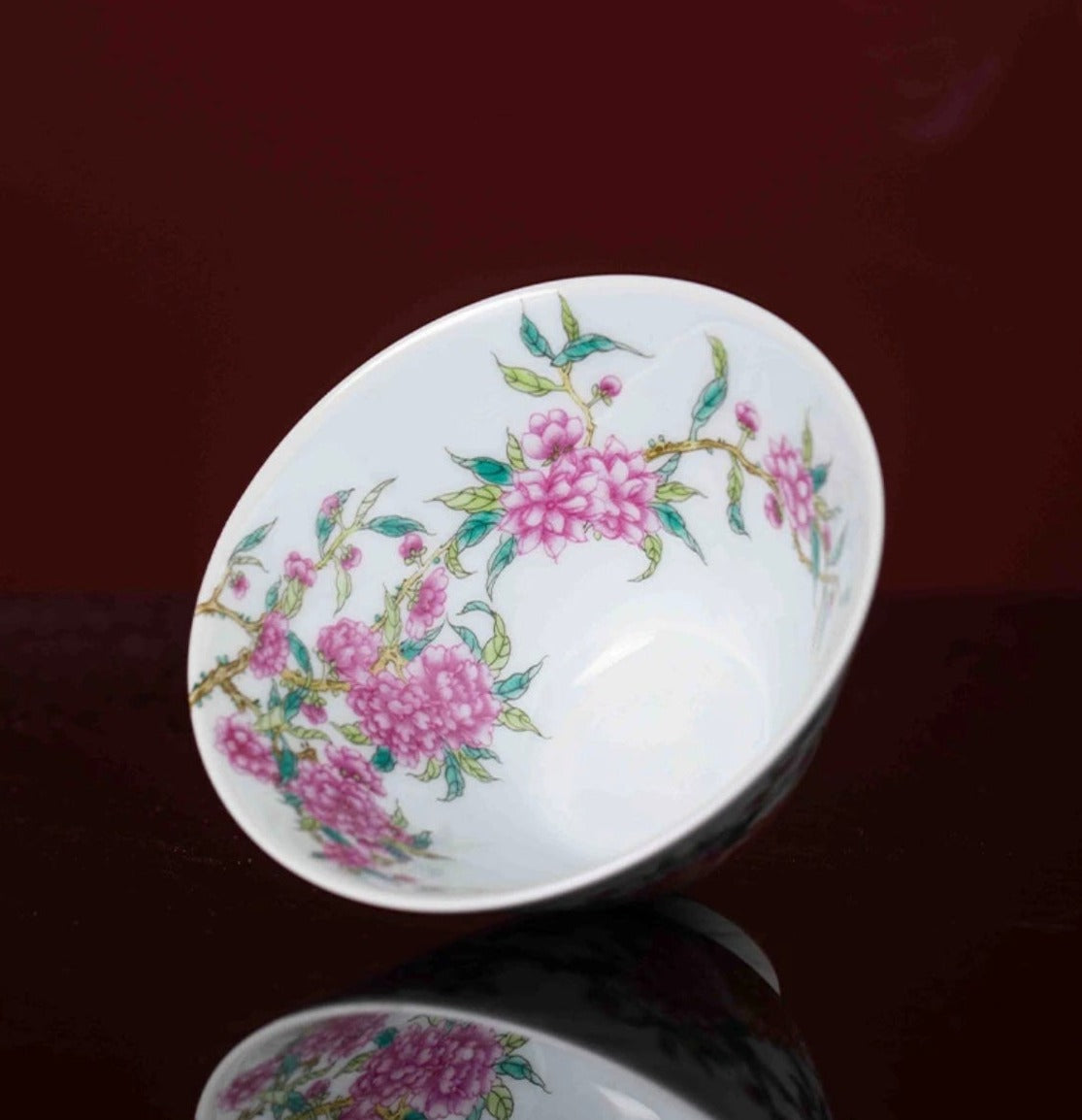 This is a Chinese Jingdezhen enamel flower teacup